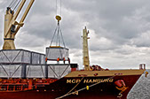 Cargo ship is loading cargo inThailand's Harbor