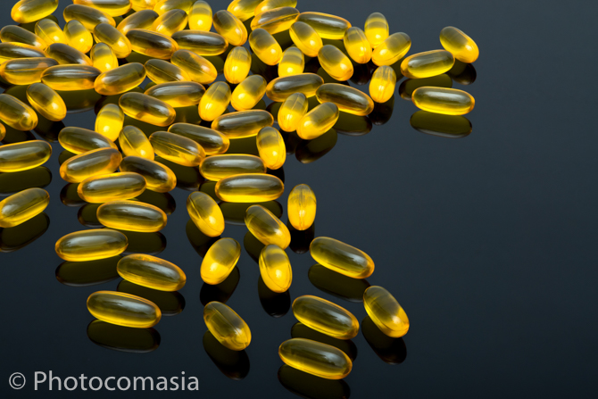 Gold ring with diamonds On the white background