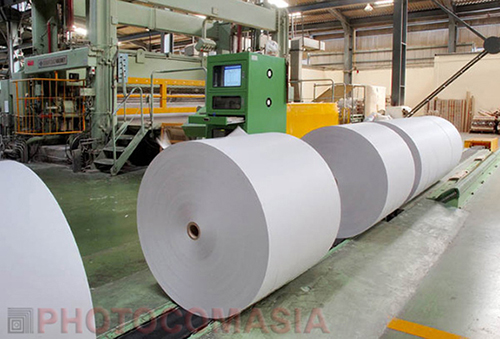 Production line in the pape factory Rolls of paper Coming out from paper factory In Thailand