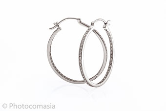 Gold ring with diamonds On the white background