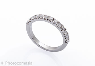 Gold ring with diamonds On the white background