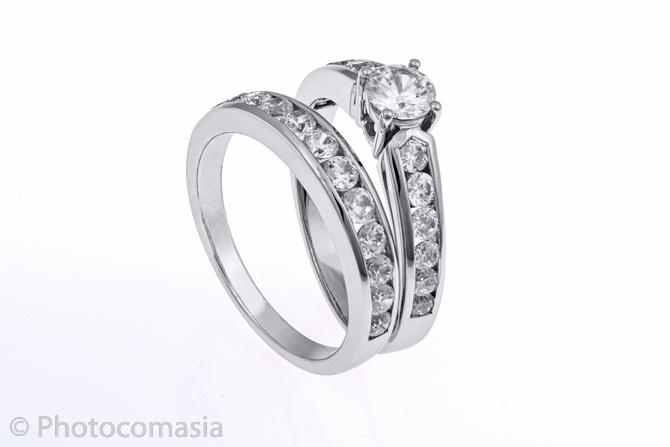 Gold ring with diamonds On the white background