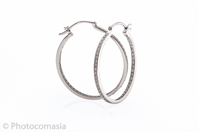 Gold ring with diamonds On the white background