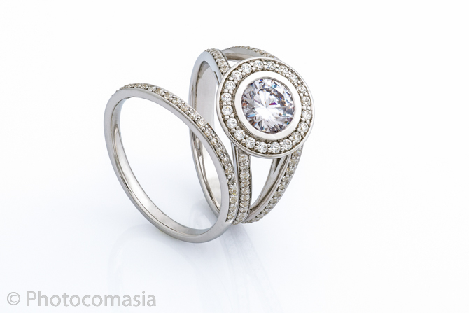 Gold ring with diamonds On the white background